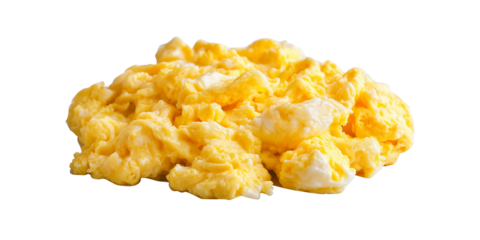 A pile of fluffy, scrambled eggs with a rich yellow color, Isolated on white background.