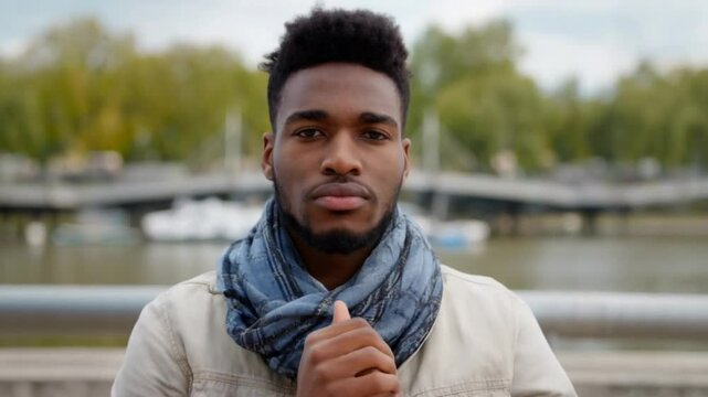 young handsome black man with crossed arms  looking at camera