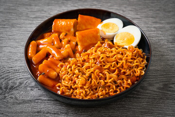 Korean instant noodles with Korean rice cake and fish cake and boiled egg