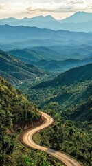 Winding Road Through Lush Green Mountains and Scenic Landscape