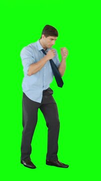 Businessman in fighting stance
