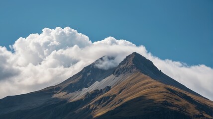 Fototapeta premium there is a mountain with a cloud in the sky above it
