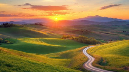 A serene landscape at sunset with rolling hills and a winding road.