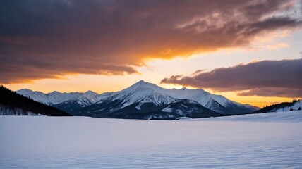 mountains in the distance with snow on them and a person on skis