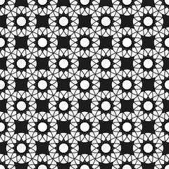 Abstract tile pattern made of round white on a dark background