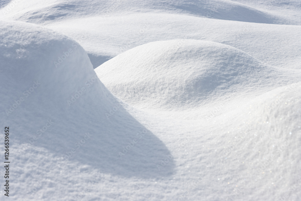 Wall mural abstract background of mounds of fresh white snow with light and shadow