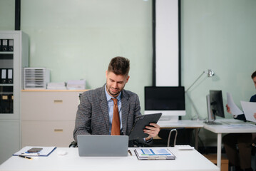 Confident businessman works on analytics, tax reports and financial research. Success, accounting and strategy