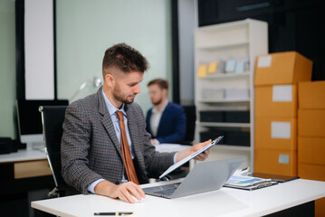 Confident businessman works on analytics, tax reports and financial research. Success, accounting and strategy