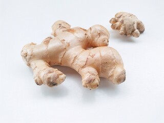 Close-up of ginger (Zingiber Officinale) on a white background.