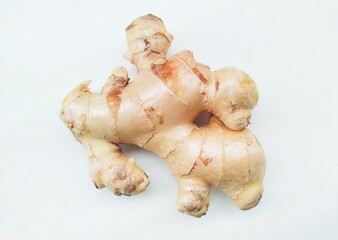 Close-up of ginger (Zingiber Officinale) on a white background.