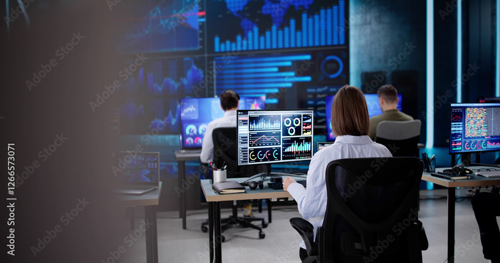 Poster Analyzing KPI Dashboard graphs on a black tablet in office