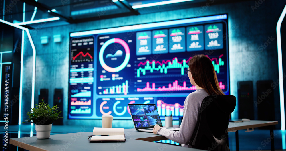 Poster businessman analyzing market data on desktop dashboard