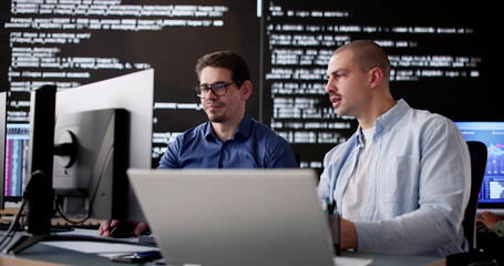Multiracial Group of Engineers Coding Software