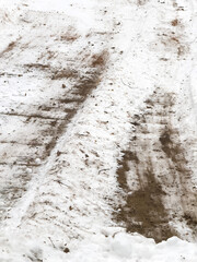 Ridges of plowed snow on the ground