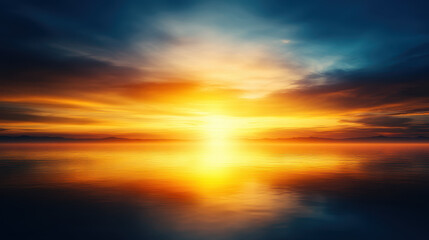 Fototapeta premium Stunning golden sunrise over calm water, reflecting vibrant colors