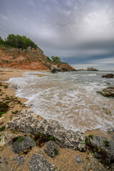 A rocky beach  by the sea