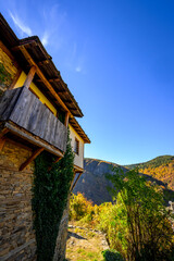 house in the autumn mountains