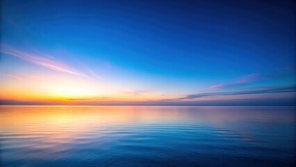 Obraz premium Soft gradient blue hour sky with subtle blending of colors across the horizon