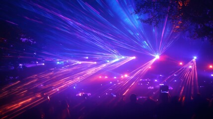 Colorful Laser Lights at an Outdoor Night Concert Event