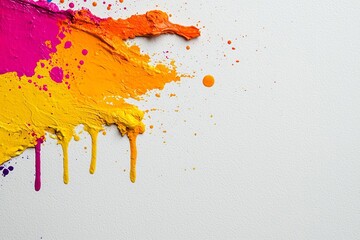 Colorful paint splashes create an abstract art background for creativity and expression.