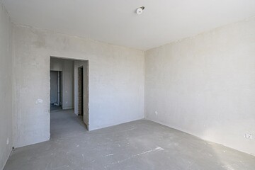 rough repairs for self-finishing. interior decoration, bare walls of the room, stage of construction. interior apartment room