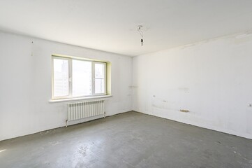 rough repairs for self-finishing. interior decoration, bare walls of the room, stage of construction. interior apartment room