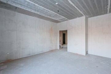 rough repairs for self-finishing. interior decoration, bare walls of the room, stage of...