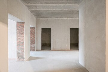 rough repairs for self-finishing. interior decoration, bare walls of the room, stage of construction. interior apartment room