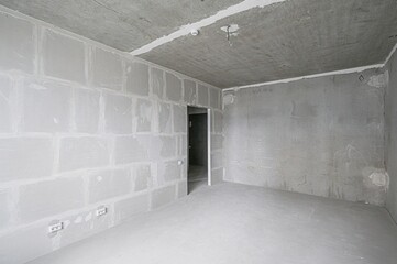 rough repairs for self-finishing. interior decoration, bare walls of the room, stage of construction. interior apartment room