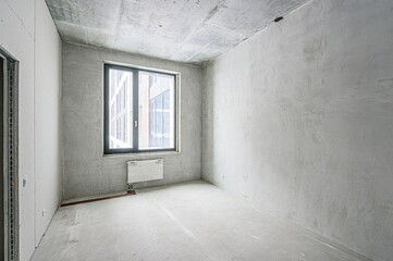 rough repairs for self-finishing. interior decoration, bare walls of the room, stage of construction. interior apartment room