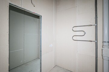 rough repairs for self-finishing. interior decoration, bare walls of the room, stage of construction. interior apartment room