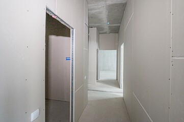 rough repairs for self-finishing. interior decoration, bare walls of the room, stage of construction. interior apartment room
