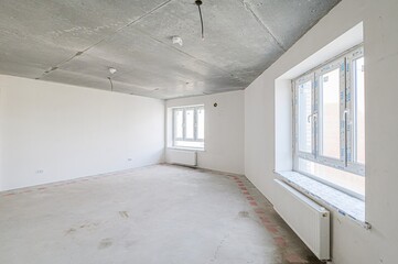 rough repairs for self-finishing. interior decoration, bare walls of the room, stage of construction. interior apartment room