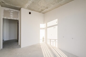 rough repairs for self-finishing. interior decoration, bare walls of the room, stage of construction. interior apartment room