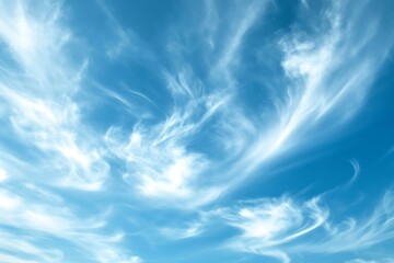 Blue sky background with white clouds.