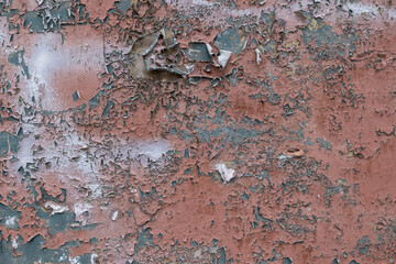 Weathered painted brown wall as a texture