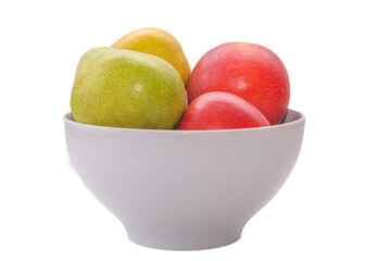 Isolated bowl with pears and apples on a white background, side view