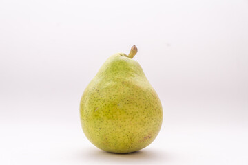 One yellow pear on a white background