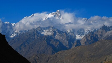Panoramic view of Ultar Peak (7388 m, also Ultar Sar, Bojohagur Duanasir II) - the southeasternmost...