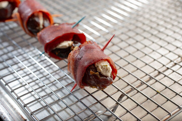 A view of some devils on horseback on a wire rack.