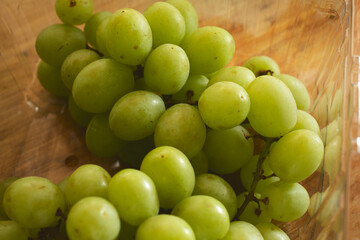 A view of a cluster of green table grapes.