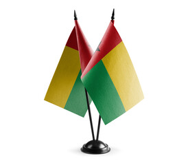 Small national flags of the Guinea Bissau on a white background