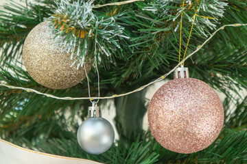 Christmas tree balls on a tree close-up