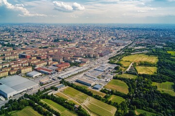 Fototapeta premium Aerial view of a city with many buildings and streets, suitable for urban planning or architecture projects