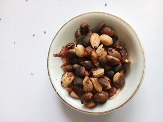 Bowl of Roasted Nuts on solid Background