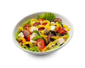 Delicious fresh Greek salad in bowl on white background