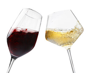 Glasses of splashing wine isolated on white