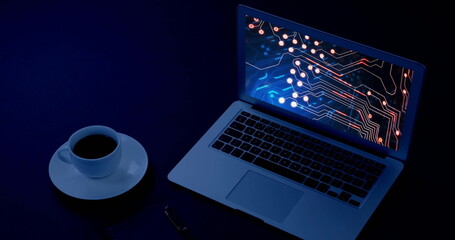 Image of digital data processing over laptop computer screen