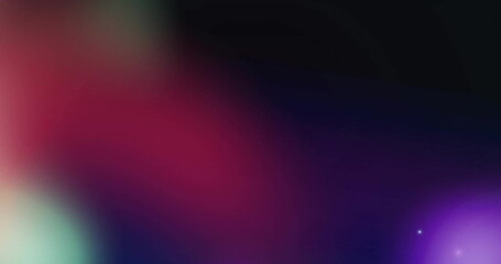 Image of glowing spots of light moving on purple background