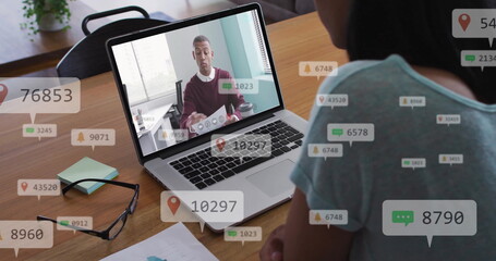 Image of social media data processing over diverse business people on laptop image call